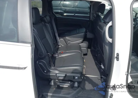 2023 Honda Odyssey Touring z USA, uszkodzony, nr VIN 5FNRL6H80PB004704